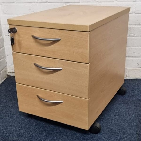 Wooden three-drawer filing cabinet on wheels with a lock