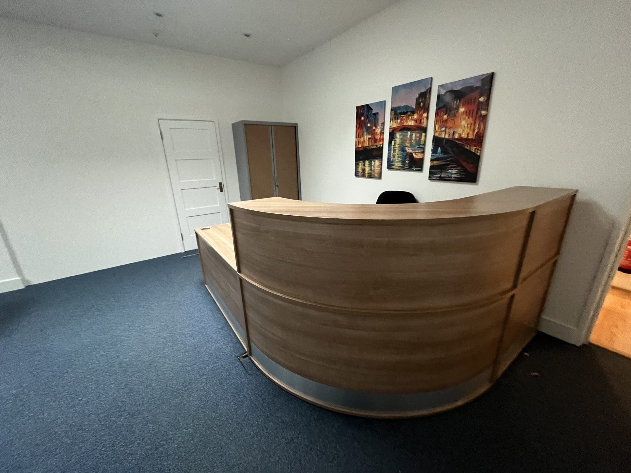 Wooden rounded corner reception desk front view