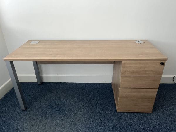 Wooden desk with a wooden cabinet as its right leg
