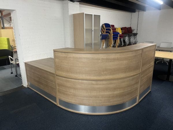 Wooden rounded corner reception desk front view